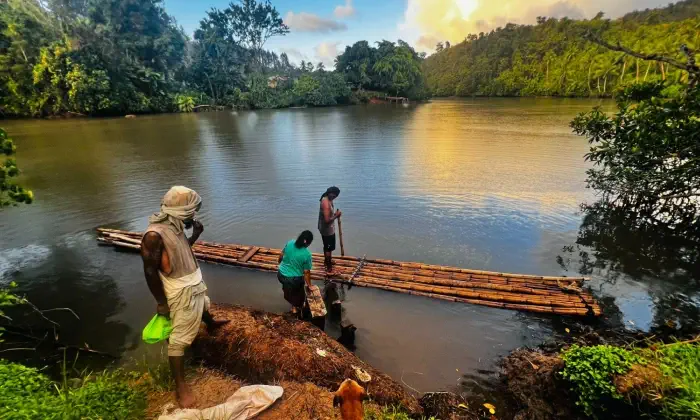 Villagers in Rauriko Village, Dogotuki District, Macuata Province, Fiji prepare to travel to another village to share food.