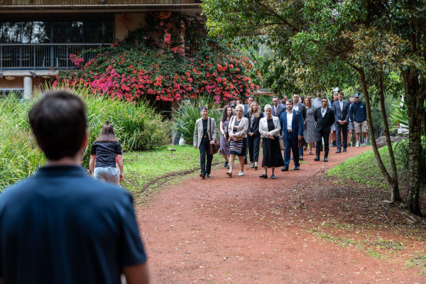 Delegation walking around the Wollotika Institute